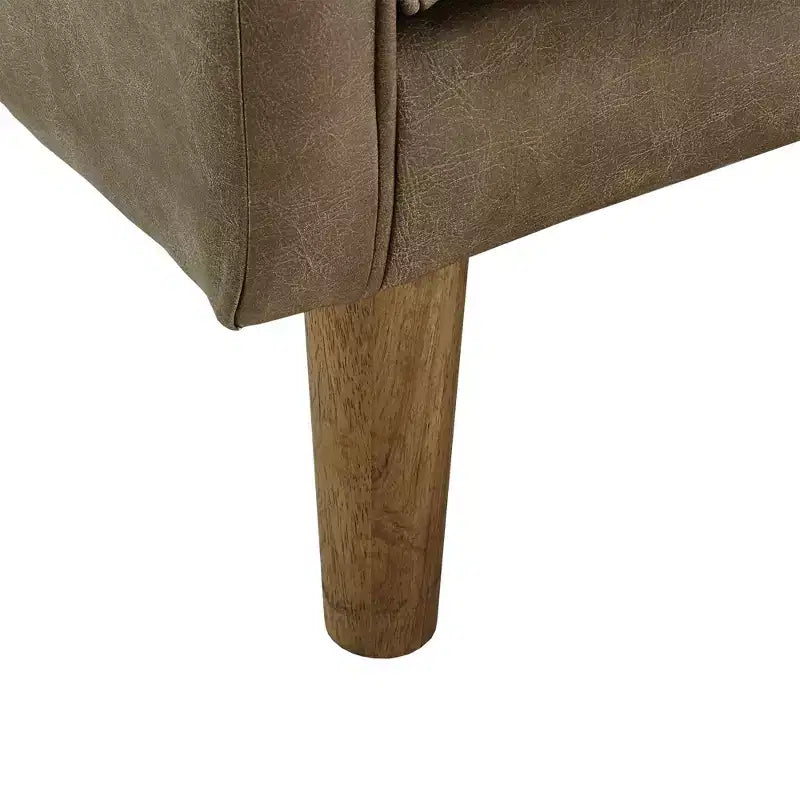 Poltrona accentuata imbottita color cammello con gambe in legno